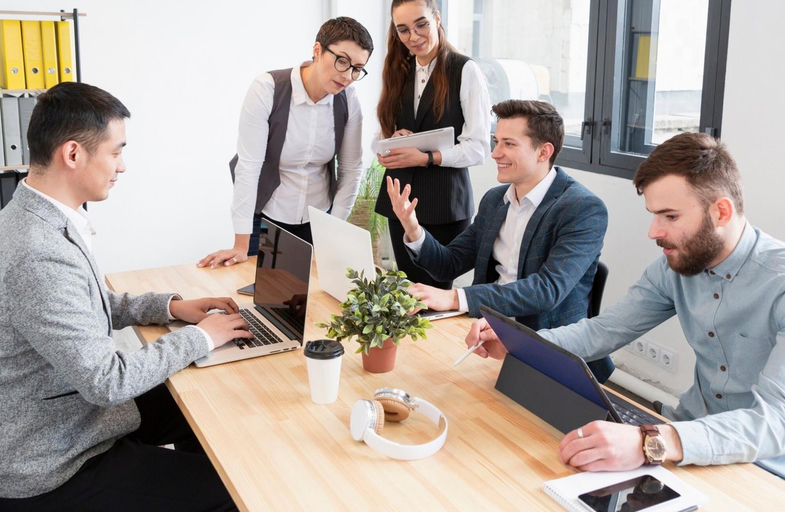 Strategic business planning session with charts and analysis